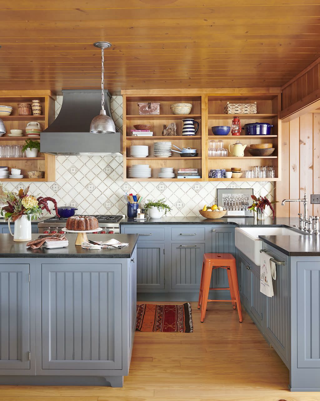 rustic kitchen with blue cabinets