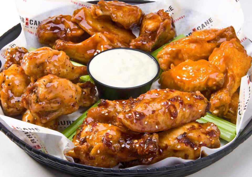 A platter of different flavored wings from Hurricane Grill & Wings. The restaurant has special days when kids eat free when accompanied by a paying adult.