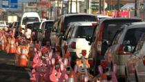 Hundreds of kilometres from Japan's quake-hit atomic power plants, residents of Akita are stocking up on essentials and dozens of cars form long queues at petrol stations amid warnings of fuel shortages. 