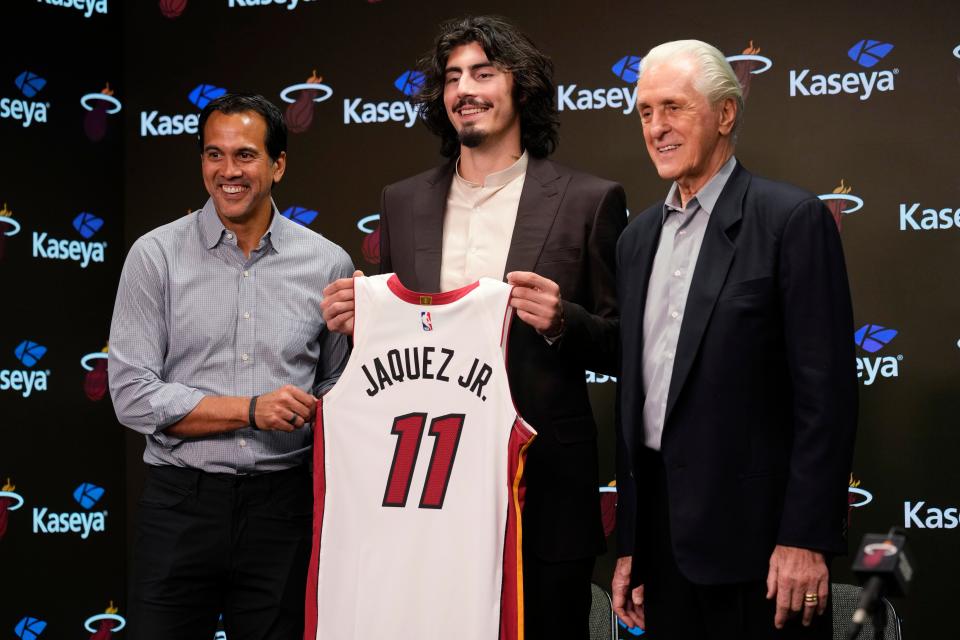 Miami head coach Erik Spoelstra, left, and team president Pat Riley, right, introduce Camarillo's Jaime Jaquez Jr. during a news conference June 23 in Miami. Jaquez was selected 18th overall in the NBA Draft and has thrived in his rookie season for the Heat.