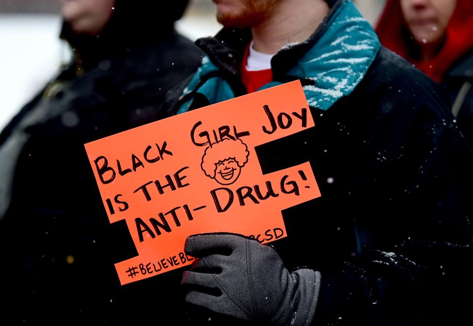 Community members, activists and members of Progressive Leaders Of Tomorrow (PLOT) rally in front of East Middle School in Binghamton to protest the recent alleged strip search of four female students. Tuesday, January 29, 2019.