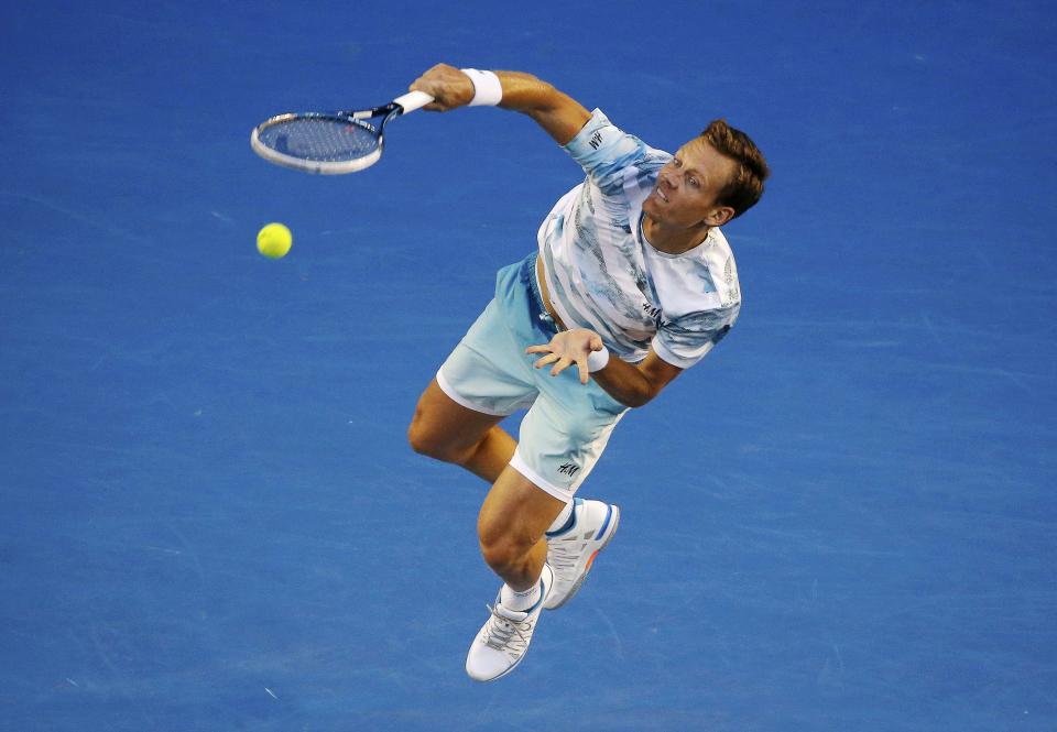 Tomas Berdych of Czech Republic serves to Andy Murray of Britain during men's singles semi-final match at the Australian Open 2015 tennis tournament in Melbourne January 29, 2015. REUTERS/Carlos Barria (AUSTRALIA - Tags: SPORT TENNIS)