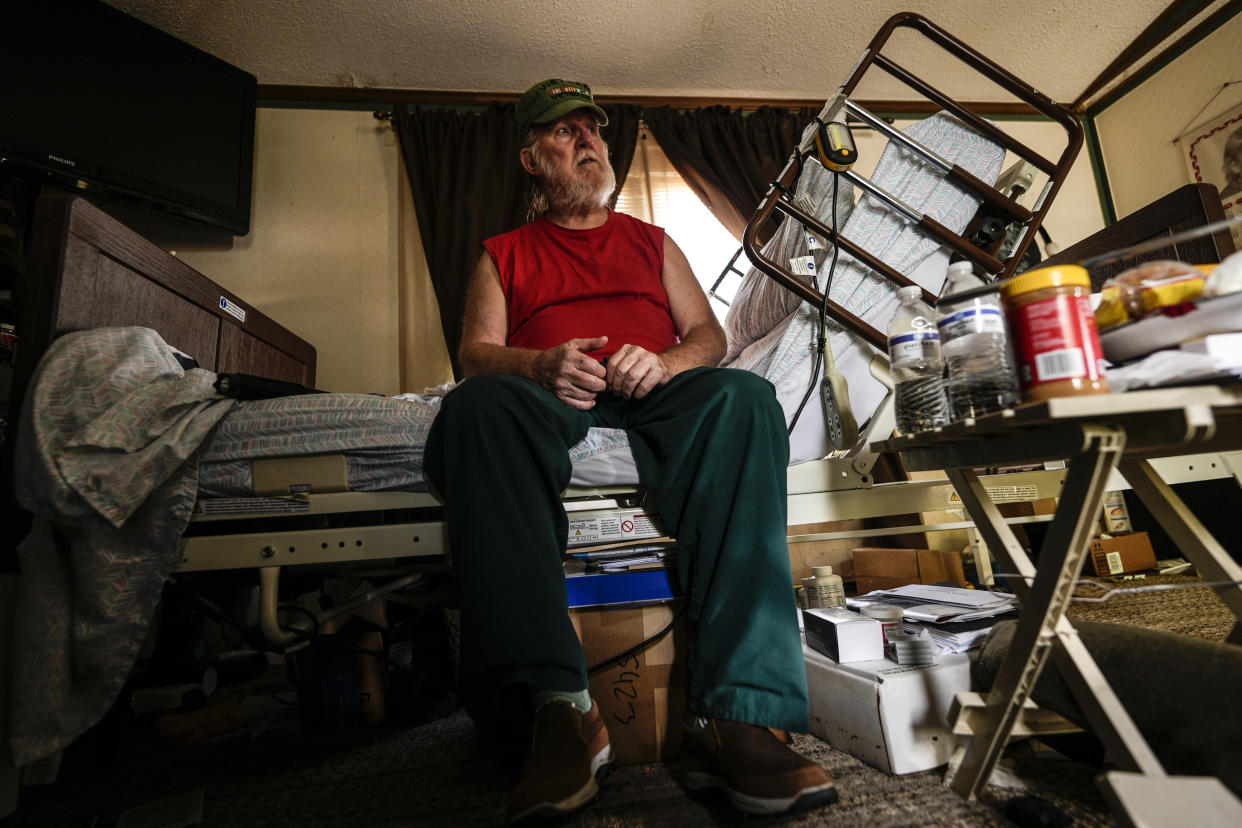 Cliff Stewart, who survived a flash flood whilst in a hospital bed, is seen in the aftermath of Hurricane Helene, Tuesday, Oct. 1, 2024, in Swannanoa, N.C. (AP Photo/Mike Stewart)