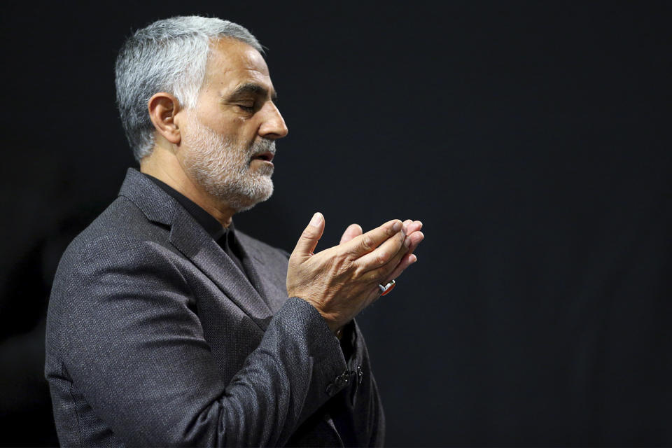 FILE - In this Friday, March 27, 2015, file photo provided by an official website of the office of the Iranian supreme leader, commander of Iran's Quds Force, Qassem Soleimani prays in a religious ceremony at a mosque in the residence of Supreme Leader Ayatollah Ali Khamenei, in Tehran, Iran. Iraqi TV and three Iraqi officials said Friday, Jan. 3, 2020, that Soleimani has been killed in an airstrike at Baghdad’s international airport. (Office of the Iranian Supreme Leader via AP, File)