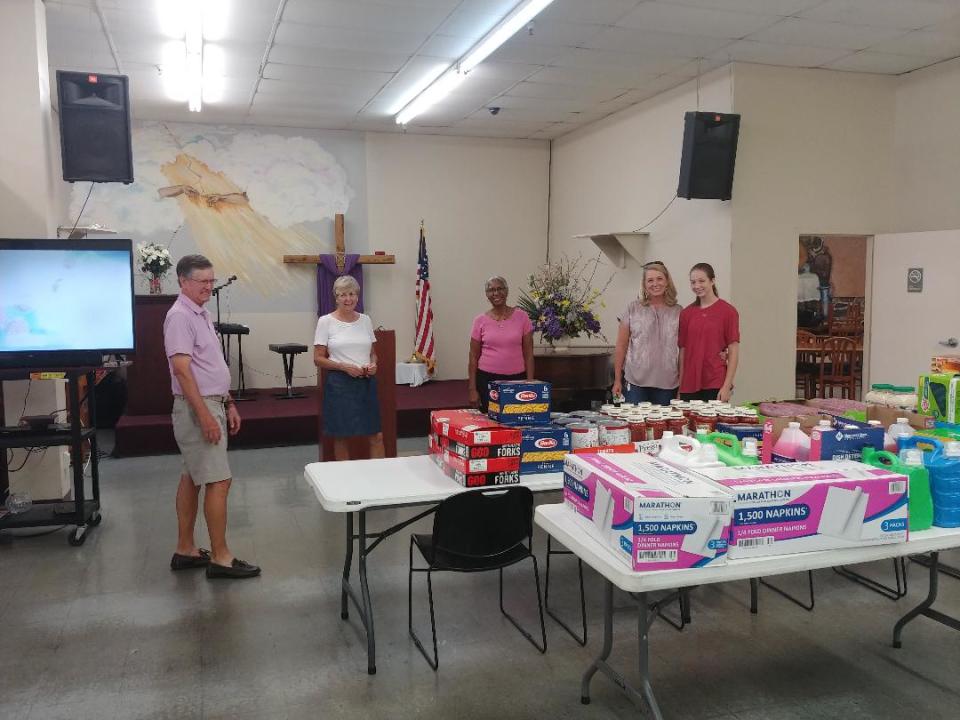 Volunteers at Old Savannah City Mission preparing for dedication of new kitchen.