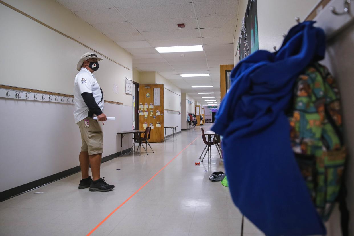 Ricardo Salayandia walks the school campus at Highland Elementary School in this file photo from the Sun-News on Dec. 16, 2021.