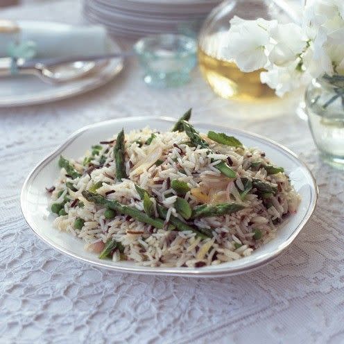 <p>This fresh tasting salad is great for a summer barbecue, picnic, or pack it up with some feta and take to work for lunch<br></p><p><strong>Recipe: <a href="https://www.goodhousekeeping.com/uk/food/recipes/asparagus-pea-and-mint-rice-salad" rel="nofollow noopener" target="_blank" data-ylk="slk:Asparagus, pea and mint rice salad;elm:context_link;itc:0;sec:content-canvas" class="link ">Asparagus, pea and mint rice salad</a></strong><br> </p>