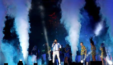 Gold Coast 2018 Commonwealth Games - Closing ceremony - Carrara Stadium - Gold Coast, Australia - April 15, 2018 - Singer Guy Sebastian performs during the closing ceremony. REUTERS/Athit Perawongmetha