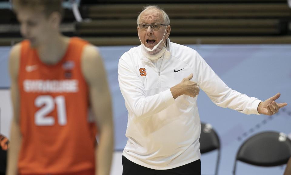 Syracuse coach Jim Boeheim talks to players during the first half against North Carolina in an NCAA college basketball game Tuesday, Jan. 12, 2021, in Chapel Hill, NC. (Robert Willett/The News & Observer via AP)