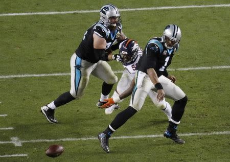 Denver Broncos' Von Miller strips the ball away from Carolina Panthers' quarterback Cam Newton (1) during the fourth quarter of the NFL's Super Bowl 50 football game in Santa Clara, California February 7, 2016. REUTERS/Michael Fiala