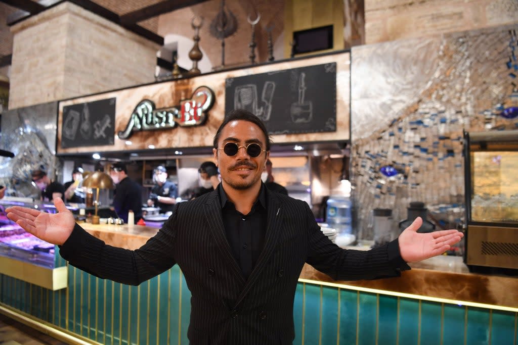 Diner says meal at Salt Bae’s new restaurant isn’t worth the money  (AFP via Getty Images)