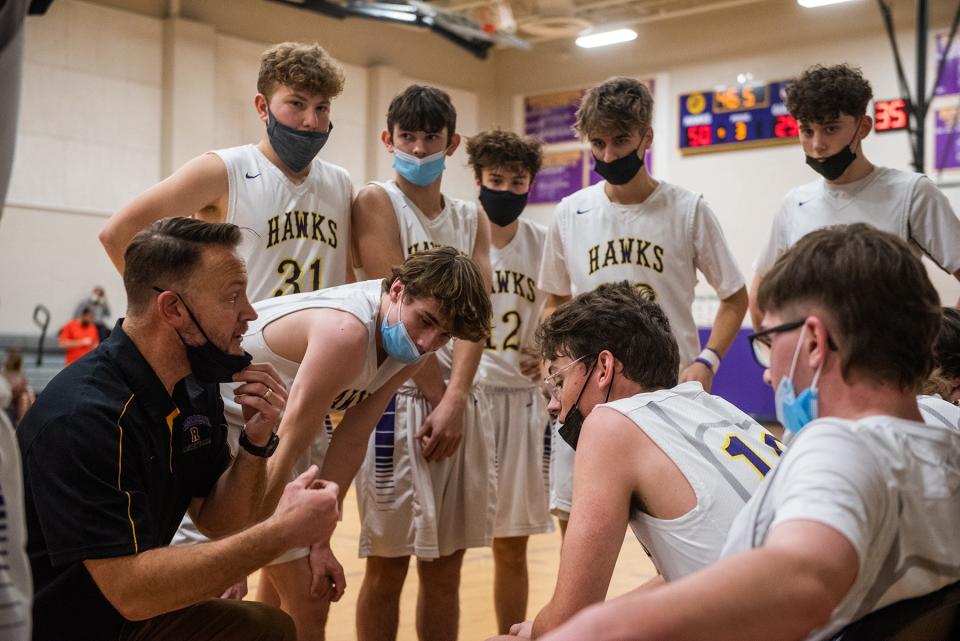 Rhinebeck head basketball coach David Aierstok talks the team during a timeout against Onteora on Friday in Rhinebeck.