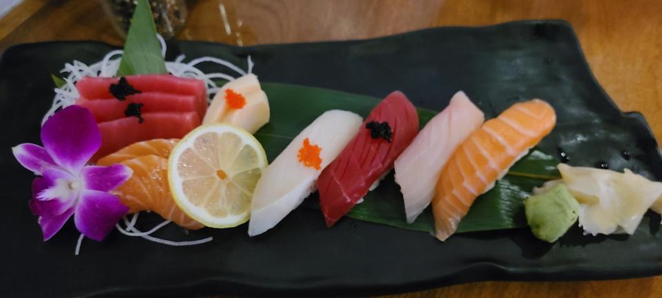 Tads of tobiko add pops of crunch to Stix's toothsome sushi and sashimi appetizer.