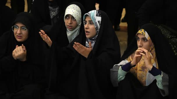 PHOTO: Iranian women watch their national soccer team play against the United States in the World Cup at a cultural center, Nov. 30, 2022, in Tehran, Iran.  (Vahid Salemi/AP Photo)