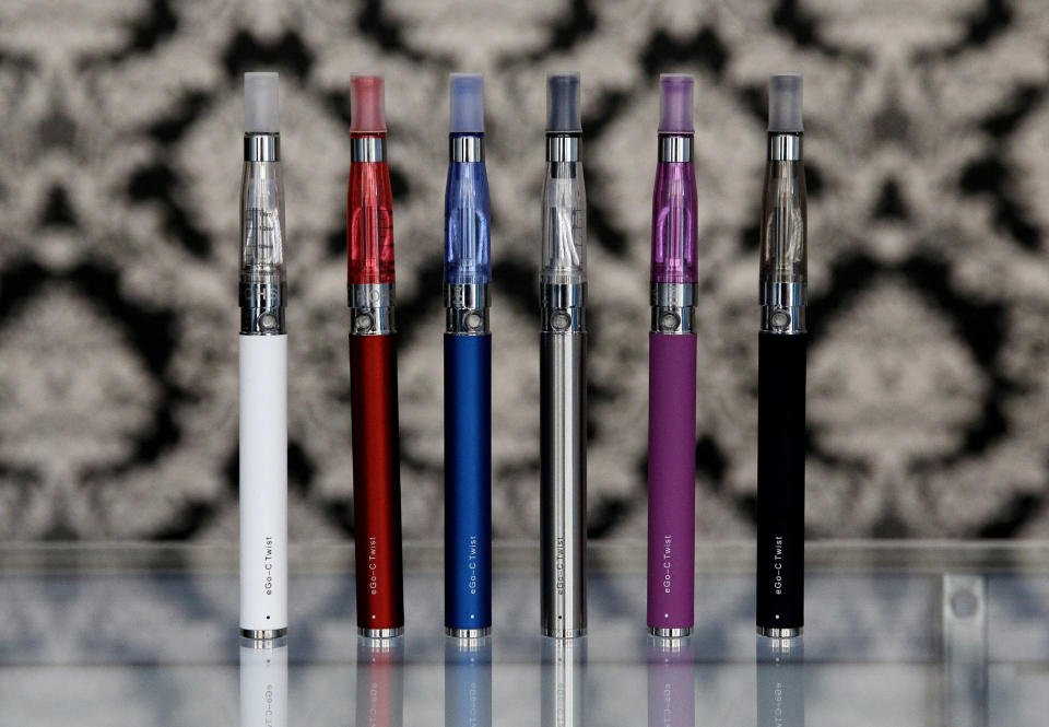 E-cigarettes appear on display at Vape store in Chicago, Wednesday, April 23, 2014. The federal government wants to ban sales of electronic cigarettes to minors and require approval for new products and health warning labels under regulations being proposed by the Food and Drug Administration. (AP Photo/Nam Y. Huh)