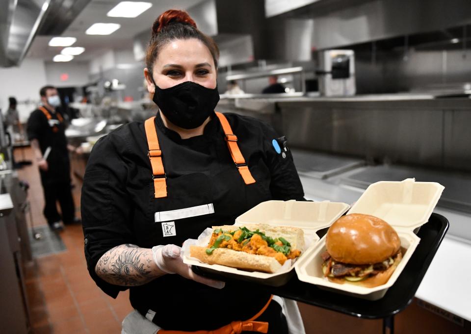 Chef Georgeann Leaming, a former Food Network "Chopped" champion, prepares menu items at FoodieHall's state-of-the-art 4,000 square-foot kitchen in Cherry Hill, N.J. Leaming no longer works for FoodieHall and has multiple other projects going on.