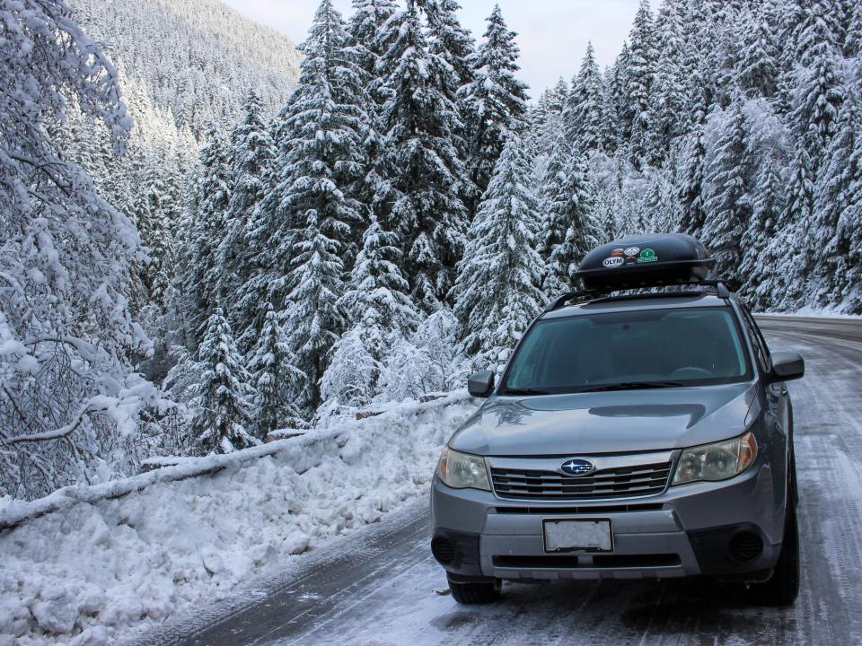 subaru forester driving through snowy mountain road nicole jordan