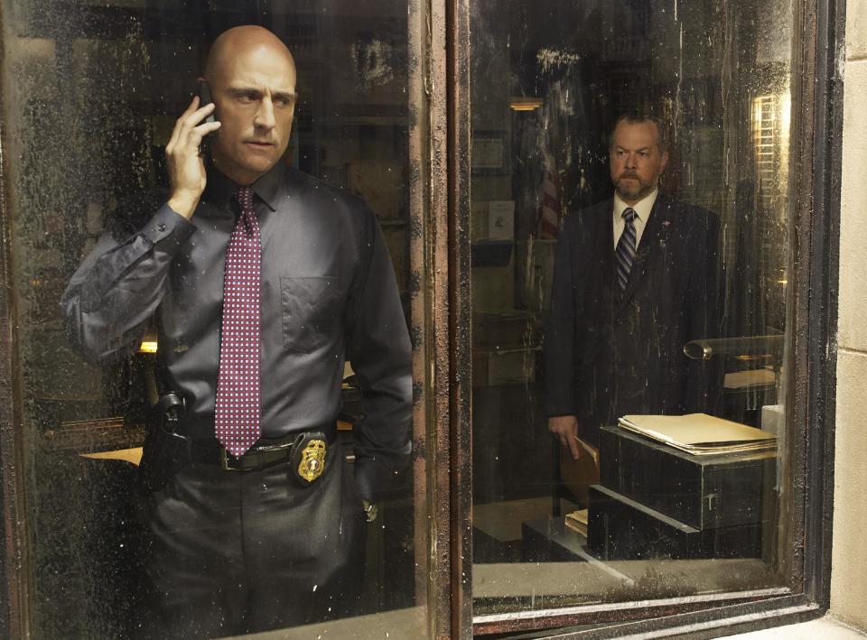 This publicity image released by AMC shows Mark Strong as Frank Agnew, left, and David Costabile as Simon Boyd in a scene from "Low Winter Sun," premiering Aug. 11, 2013. (AP Photo/AMC, Frank Ockenfels)