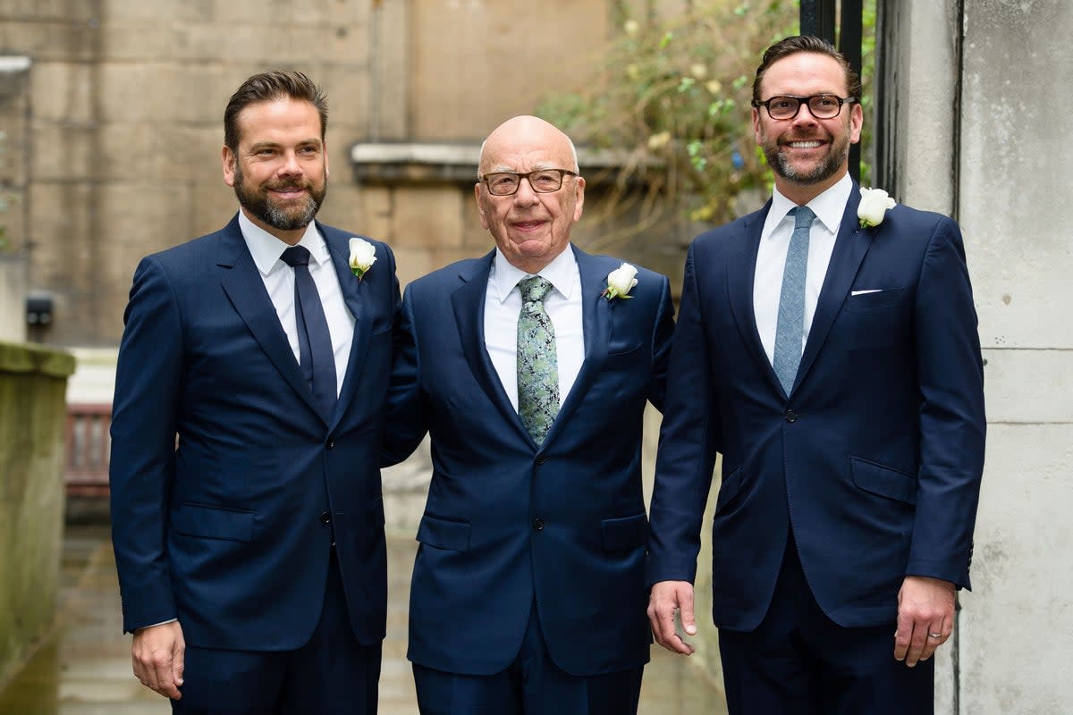 Murdoch with his sons Lachlan (left) and James (AFP/Getty)