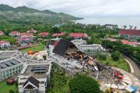 An aerial picture shows damaged governor of West Sulawesi province's office following an earthquake in Mamuju