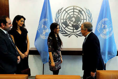 International human rights lawyer Amal Clooney arrives with Yazidi survivor Nadia Murad (C) to meet with United Nations Secretary General, Antonio Guterres, at U.N. headquarters in New York, U.S., March 10, 2017. REUTERS/Lucas Jackson