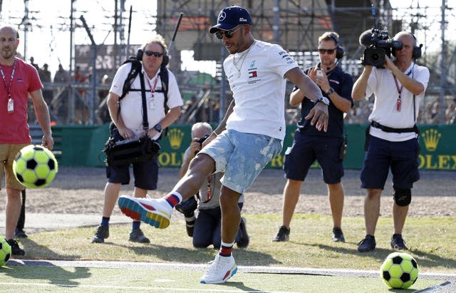 Lewis Hamilton playing football