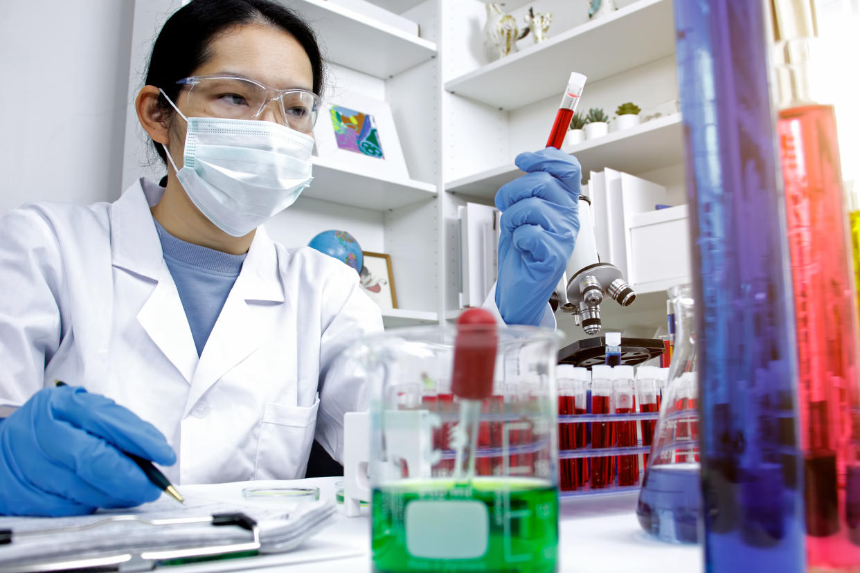 Scientist working with blood sample in laboratory. (Getty Images)
