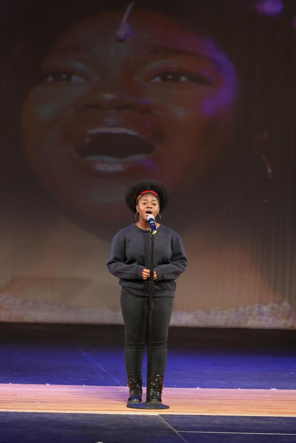 Akayla Morris, Deloris from Ossining's "Sister Act," reprises the show's title song, during Pedro's Open Mic at the Harrison Performing Arts Center at Harrison High School, May 11, 2024.