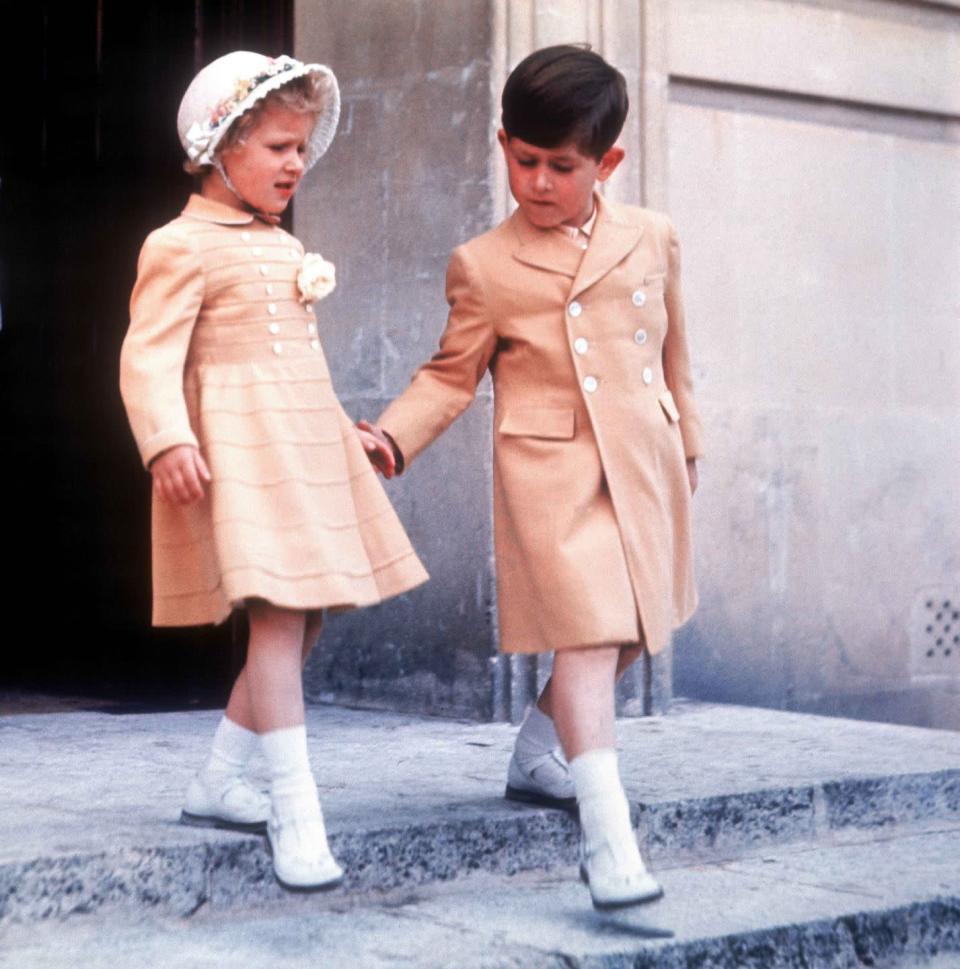 <p>With his younger sister, Princess Anne.</p>