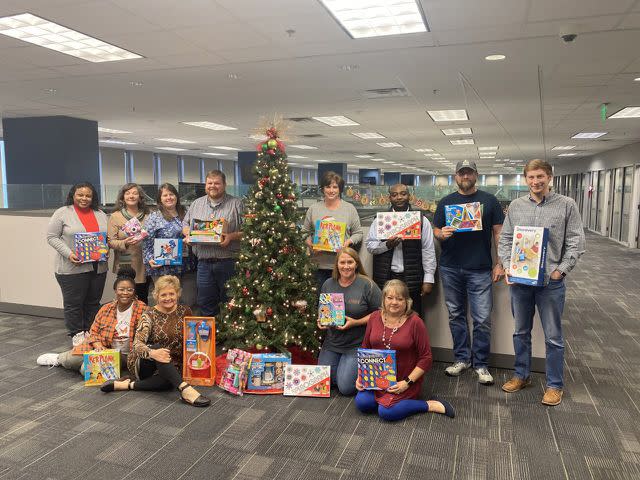 <p>Highlight Technology</p> Highlight Technologies staffers support Toys for Tots.