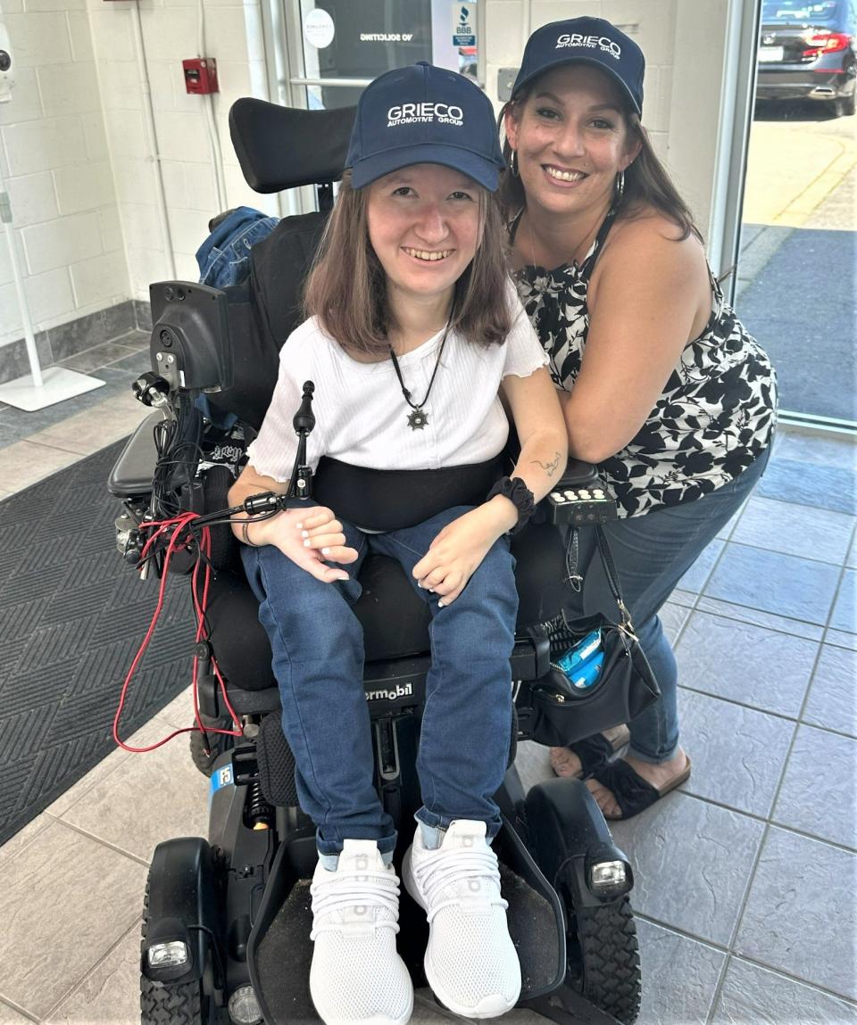 Ciarra Muller and her mom, Lacie Messier. Ciarra needs a motorized wheelchair because of a genetic disorder called spinal muscular atrophy.