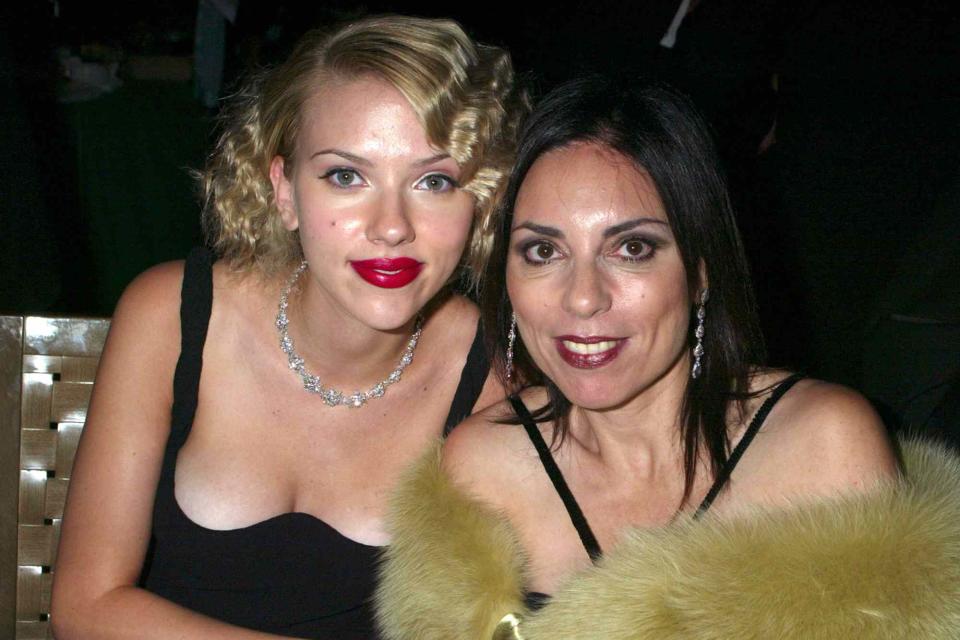 <p>Gregory Pace/FilmMagic</p> Scarlett Johansson and her mom Melanie Sloan during the 58th Annual Tony Awards after party.