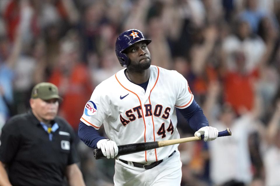 Houston Astros' Yordan Alvarez watches his home run against the Oakland Athletics during the eighth inning of a baseball game Saturday, May 20, 2023, in Houston. (AP Photo/David J. Phillip)