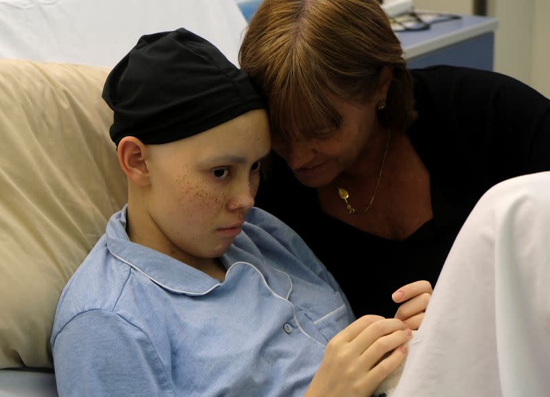 The Wider Image: The pandemic, a deadly cancer and my 14-year-old daughter