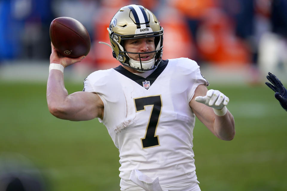 New Orleans Saints quarterback Taysom Hill (7) throws against the Denver Broncos during the first half of an NFL football game, Sunday, Nov. 29, 2020, in Denver. (AP Photo/David Zalubowski)