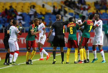 Football Soccer - African Cup of Nations - Burkina Faso v Cameroon - Stade de l'Amitie - Libreville, Gabon - 14/1/17. Cameroon and Burkina Faso players argue. REUTERS/Mike Hutchings