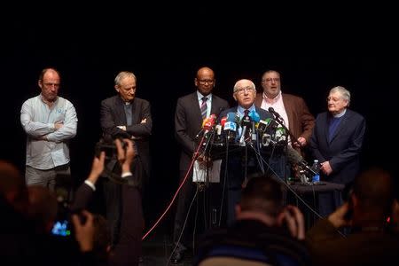 Mayor of Bayonne Jean Rene Etchegaray announces confirmation of disarmament by Basque separatists ETA, alongside Txetx Etchevery, Matteo Zuppi, Ram Manikkalingam, Mitchel Tuviana and Harold Good, in Bayonne April 8, 2017. REUTERS/Vincent West