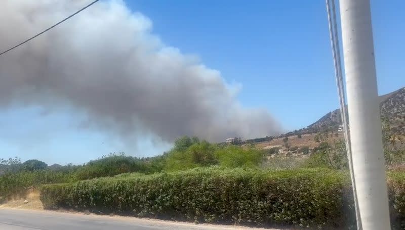 A general view of fire around the island of Kos