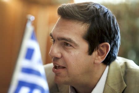 Greek Prime Minister Alexis Tsipras is seen at his office during a meeting with Palestinian Foreign Minister Riyad al-Maliki (not pictured) in Athens June 8, 2015. REUTERS/Alkis Konstantinidis