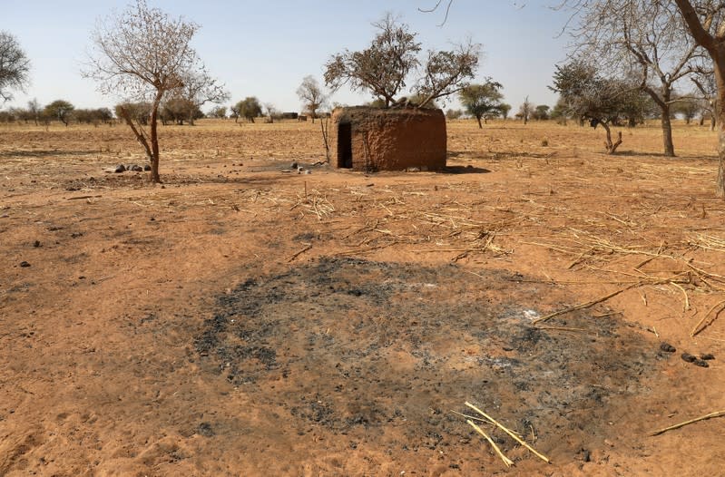 A burned and abandonned village is pictured on the road of Foube, Burkina Faso