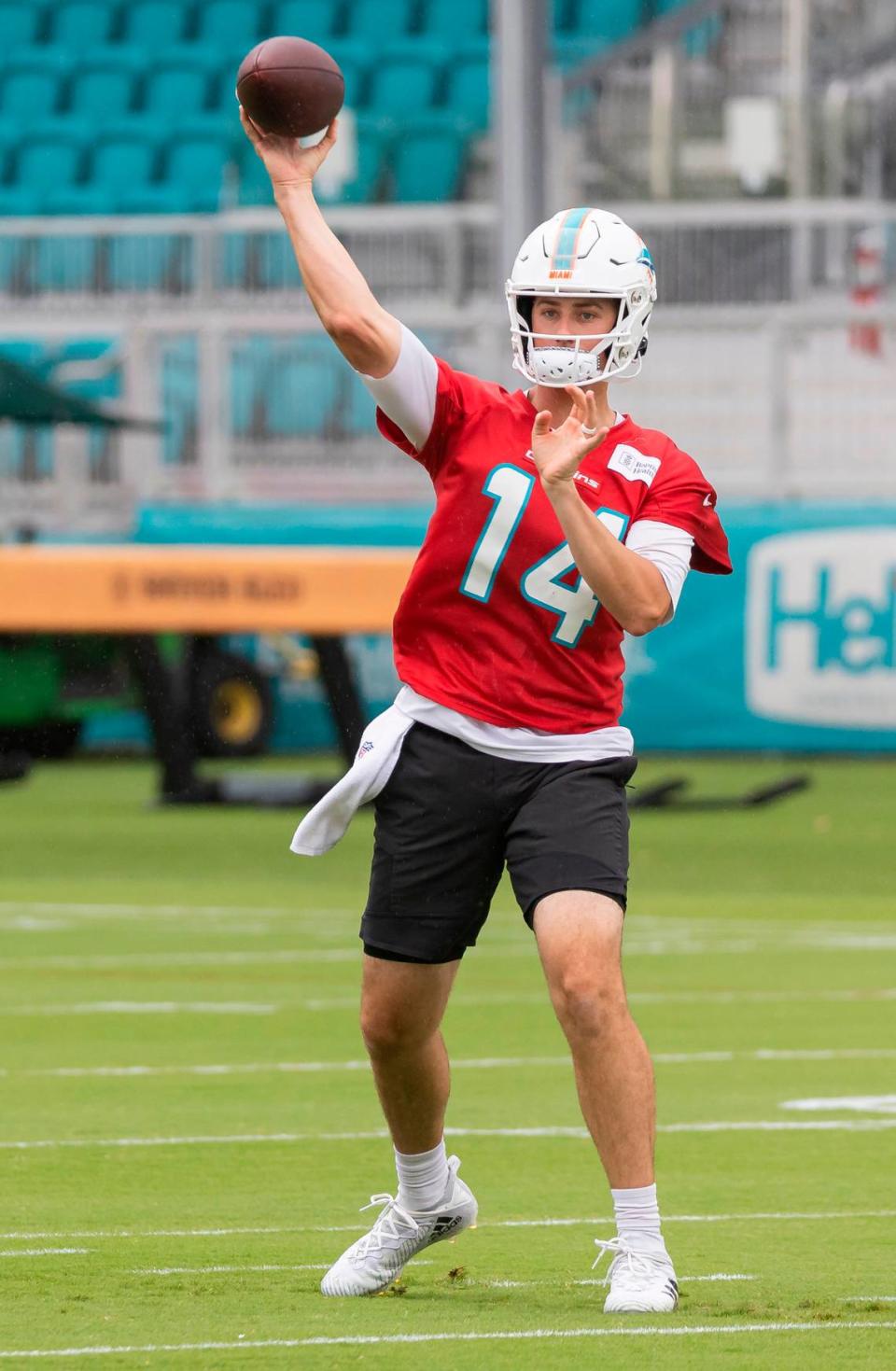 Miami Dolphins quarterback Mike White (14) throws the ball during team practice at the Baptist Health Training Complex on Tuesday, June 6, 2023, in Miami Gardens, Fla.