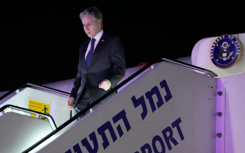 US Secretary of State Antony Blinken disembarks after arrriving at Ben Gurion International airport