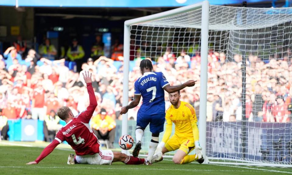 Raheem Sterling is tackled by Joe Worrall during the Premier League match between Chelsea and Nottingham Forest.