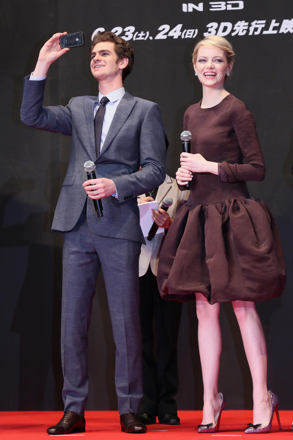 Andrew Garfield and Emma Stone attend the Tokyo premiere of "The Amazing Spider-Man" on June 13, 2012.