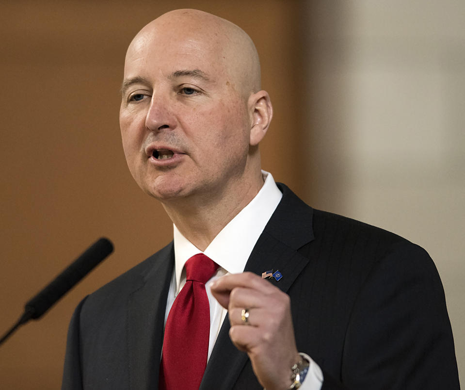FILE - In this April 18, 2018, file photo, Nebraska Gov. Pete Ricketts speaks at the legislature, in Lincoln, Neb. Three years after Nebraska lawmakers voted to abolish capital punishment, the state is preparing to carry out its first execution since 1997 on Tuesday, Aug. 14, 2018, in an about-face driven largely by Republican Gov. Pete Ricketts who helped finance a ballot drive to reinstate the punishment after lawmakers overrode his veto and abolished the punishment in 2015. (Gwyneth Roberts/Lincoln Journal Star via AP, File)