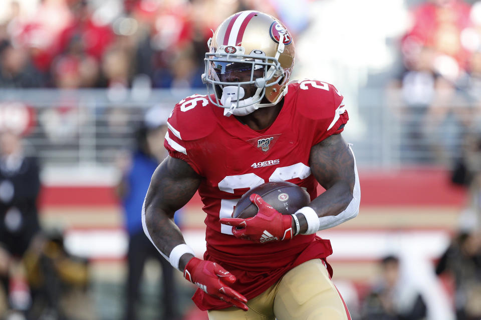 San Francisco 49ers running back Tevin Coleman (26) runs against the Atlanta Falcons during the first half of an NFL football game in Santa Clara, Calif., Sunday, Dec. 15, 2019. (AP Photo/Josie Lepe)