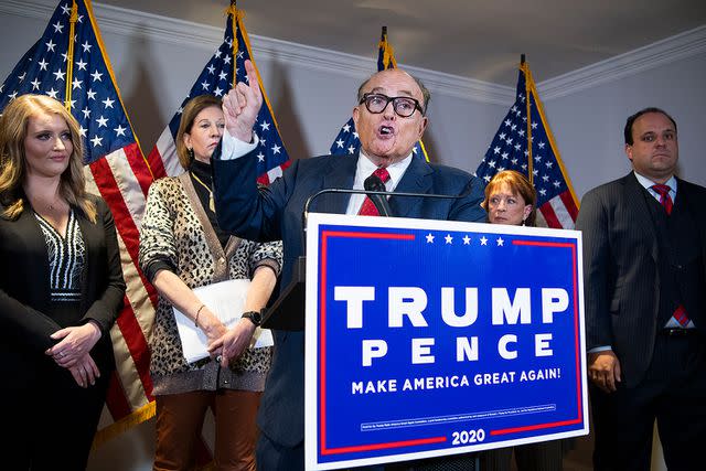 Tom Williams/CQ-Roll Call, Inc via Getty Rudy Giuliani holds a press conference after the 2020 election, accompanied by Jenna Ellis and Sidney Powell on the left