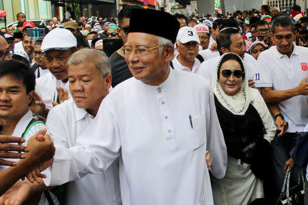 Former Malaysian Prime Minister Najib Razak and his wife Rosmah Mansor attend an Anti-ICERD (International Convention on the Elimination of All Forms of Racial Discrimination) mass rally in Kuala Lumpur, Malaysia, December 8, 2018. REUTERS/Sadiq Asyraf