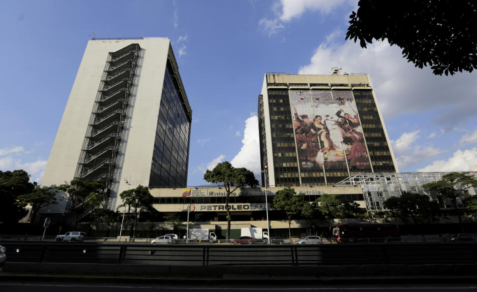 The headquarters of the state-owned oil company Petroleos de Venezuela, PDVSA, stands in Caracas, Venezuela, Monday, Jan. 28, 2019. The Trump administration imposed sanctions Monday on PDVSA, a potentially critical economic move aimed at increasing pressure on Venezuelan President Nicolas Maduro to cede power to the opposition. (AP Photo/Fernando Llano)