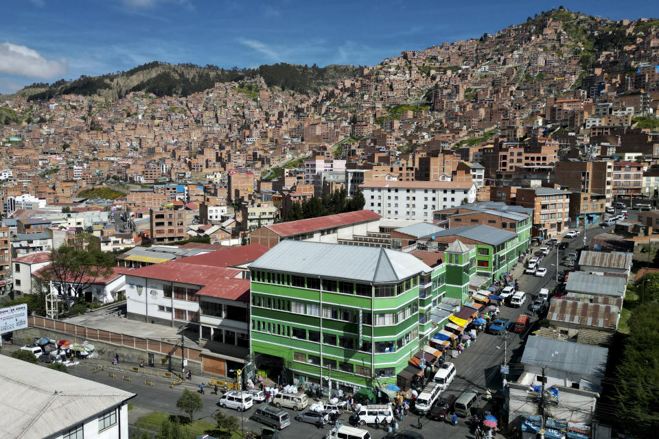 A legal coca leaf market stands on a corner in La Paz, Bolivia, Thursday, April 18, 2024. Bolivia’s government has revived a years-long battle to get the U.N. to decriminalize the coca leaf, an effort to win global recognition for its Indigenous traditions and expand its local market of coca-related products. (AP Photo/Juan Karita)